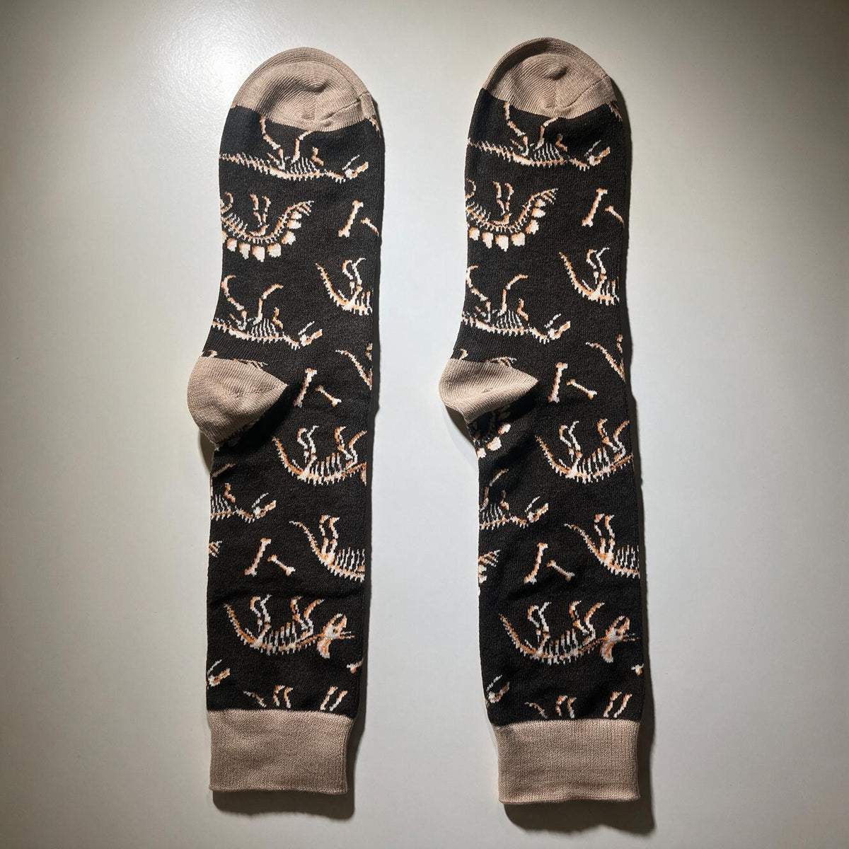 Dinosaur Fossil Print Crew Socks for Men | Brown Skeleton Bone Pattern | Fall Halloween Novelty Socks | One Size